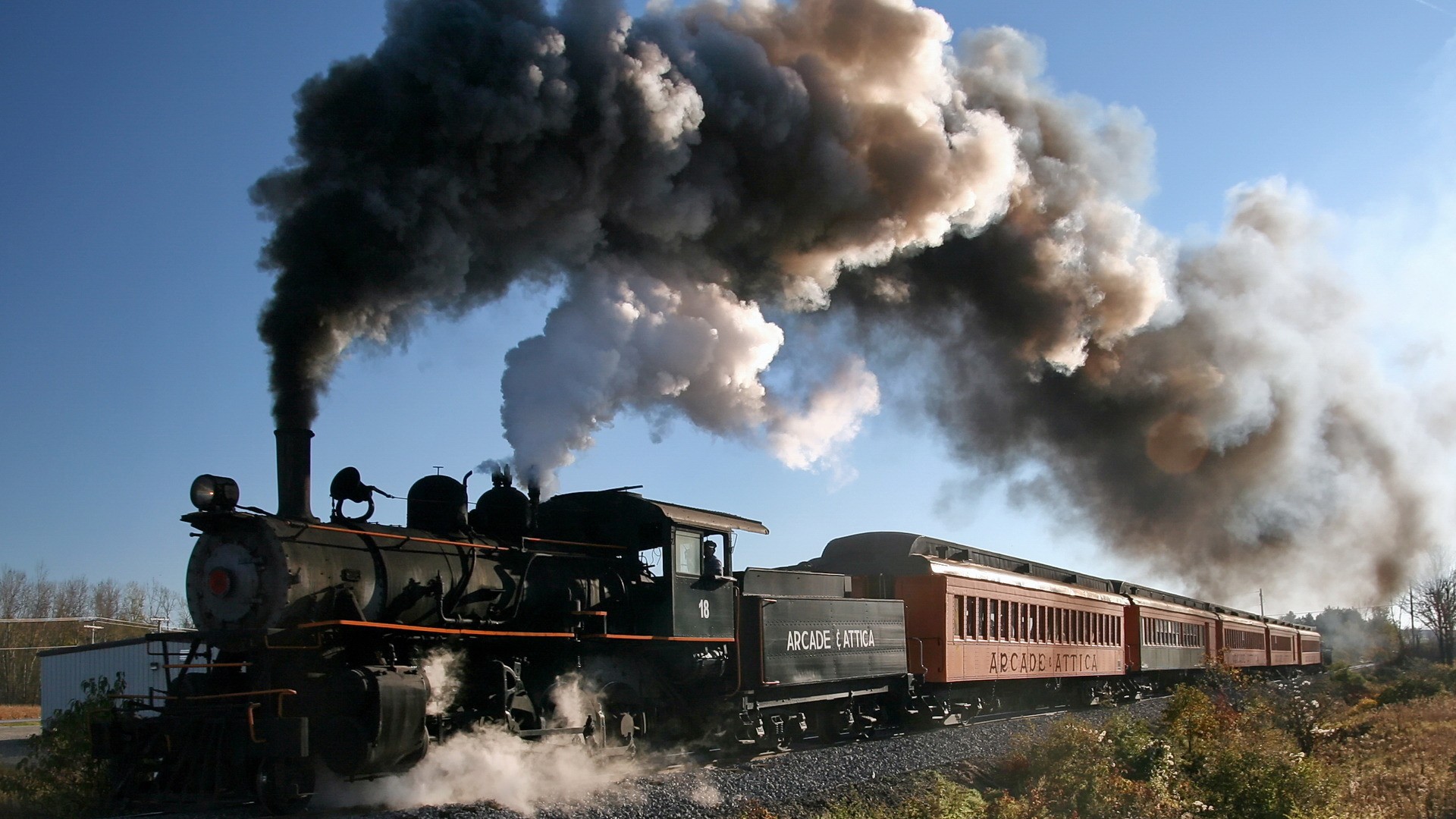 Steam train emitting smoke
