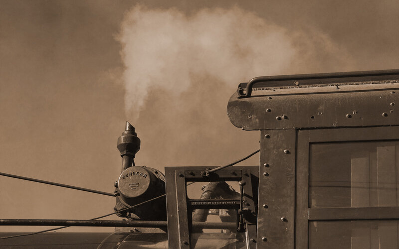 Steam train emitting smoke