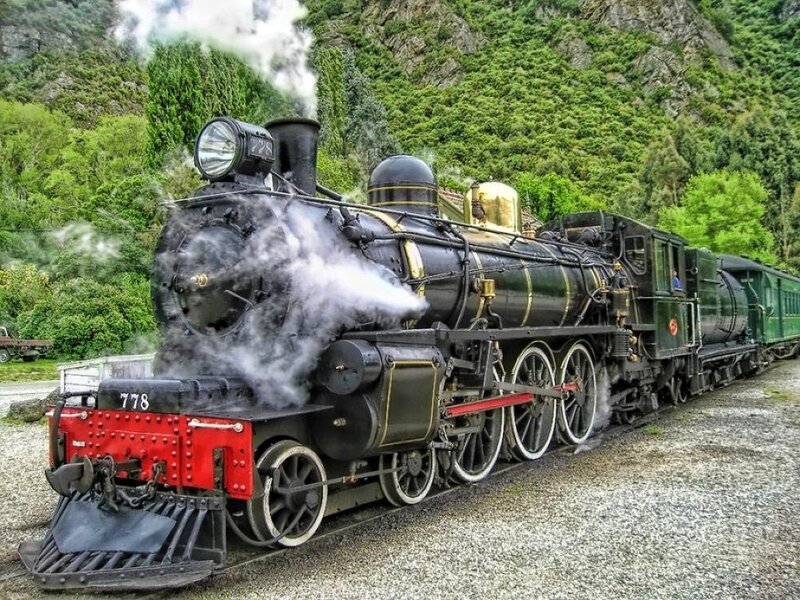 steam train in a mountain valley