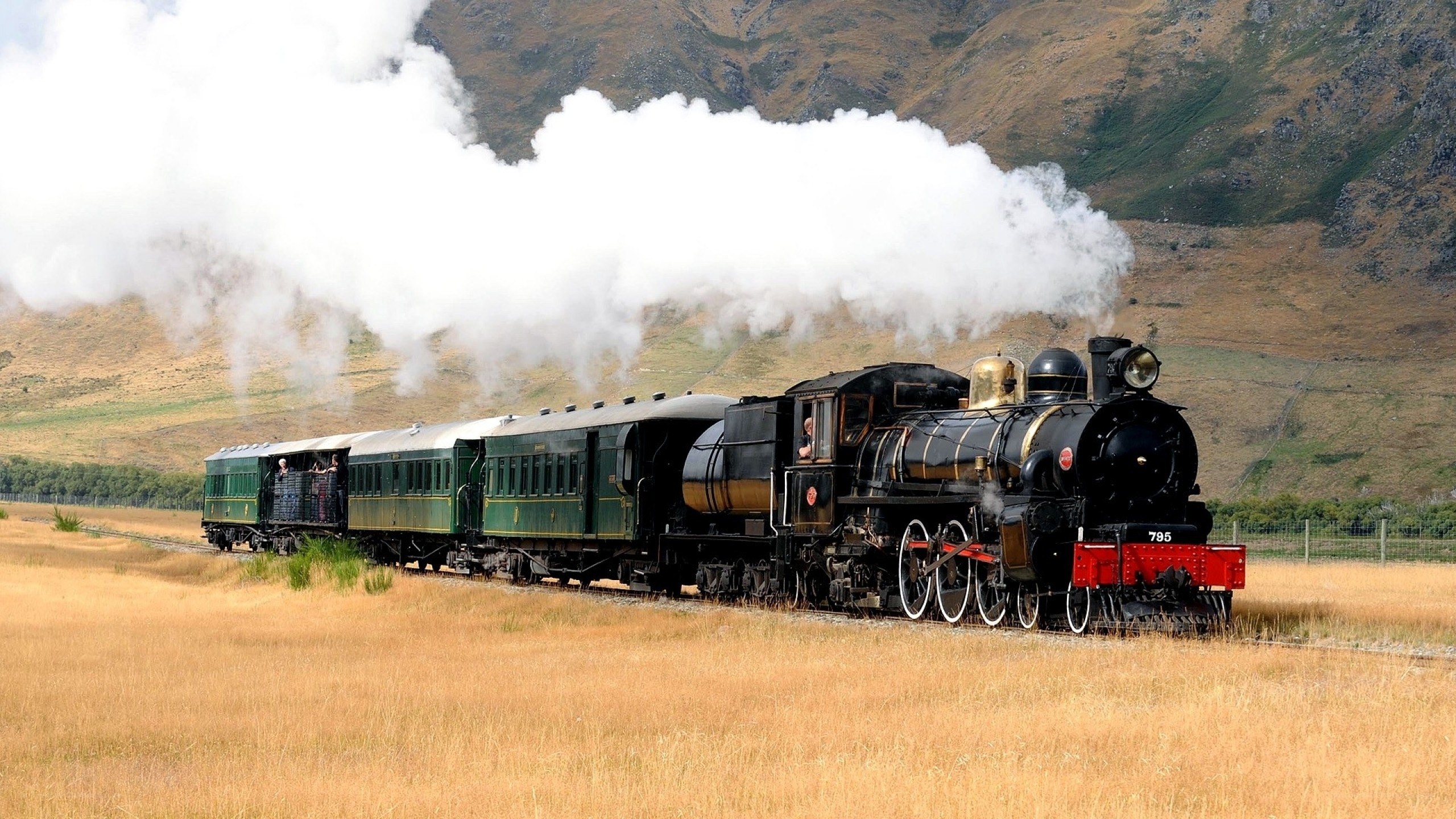 Steam train in a scenic valley