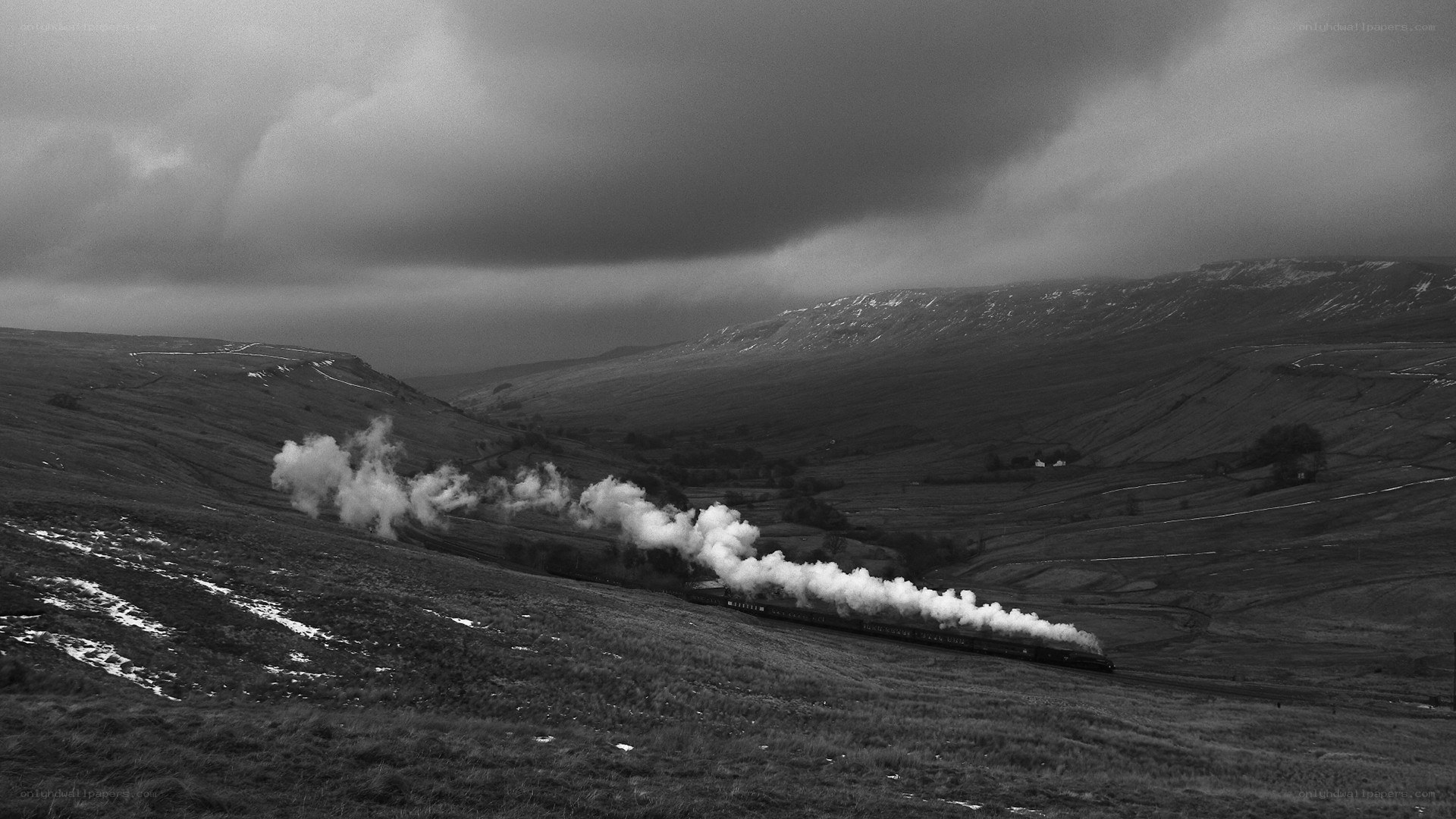 Steam train in a valley