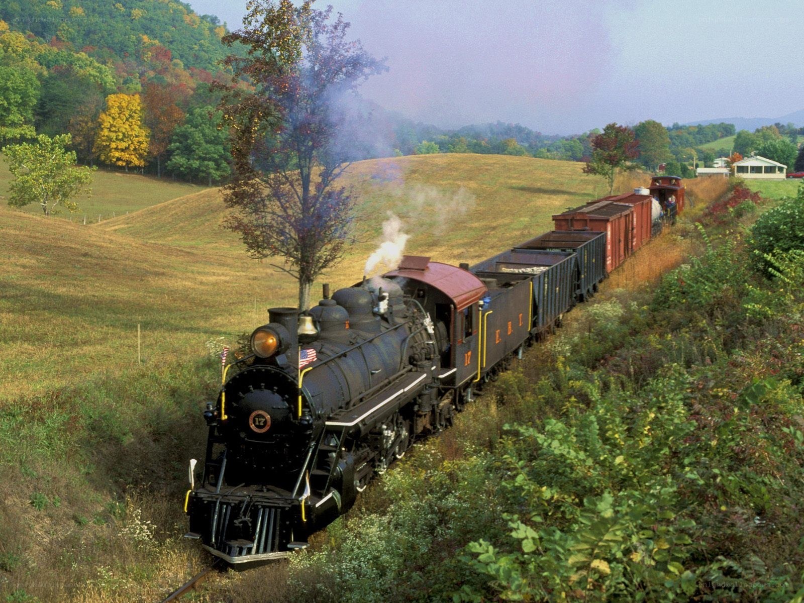 Steam train in autumn countryside