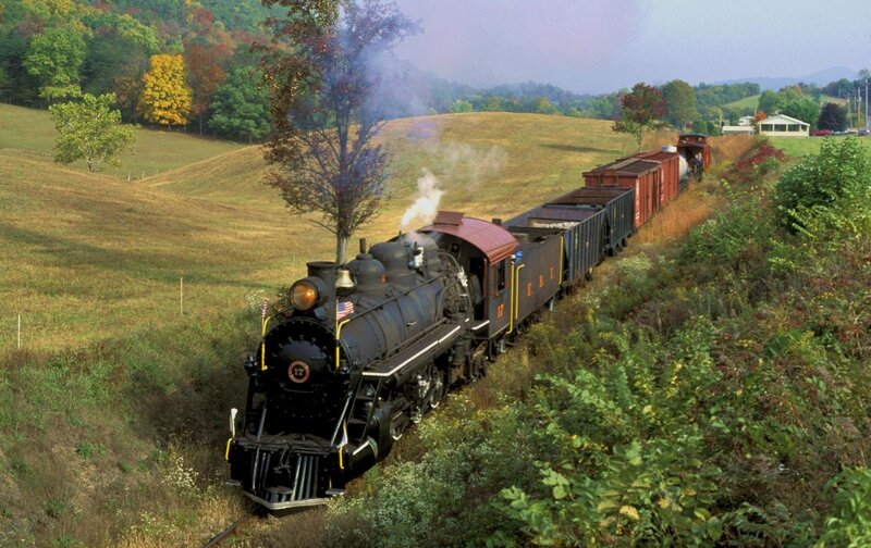 Steam train in autumn countryside