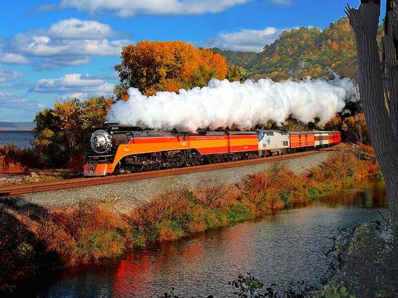 Steam train in autumn scenery