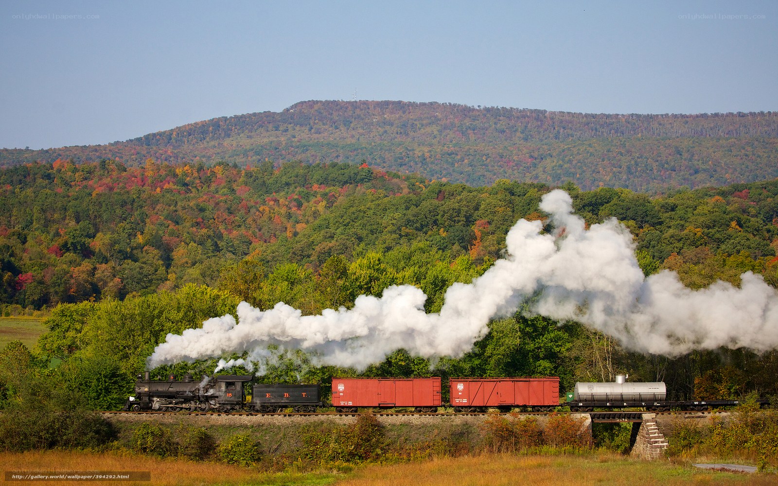 Steam train in autumn scenery