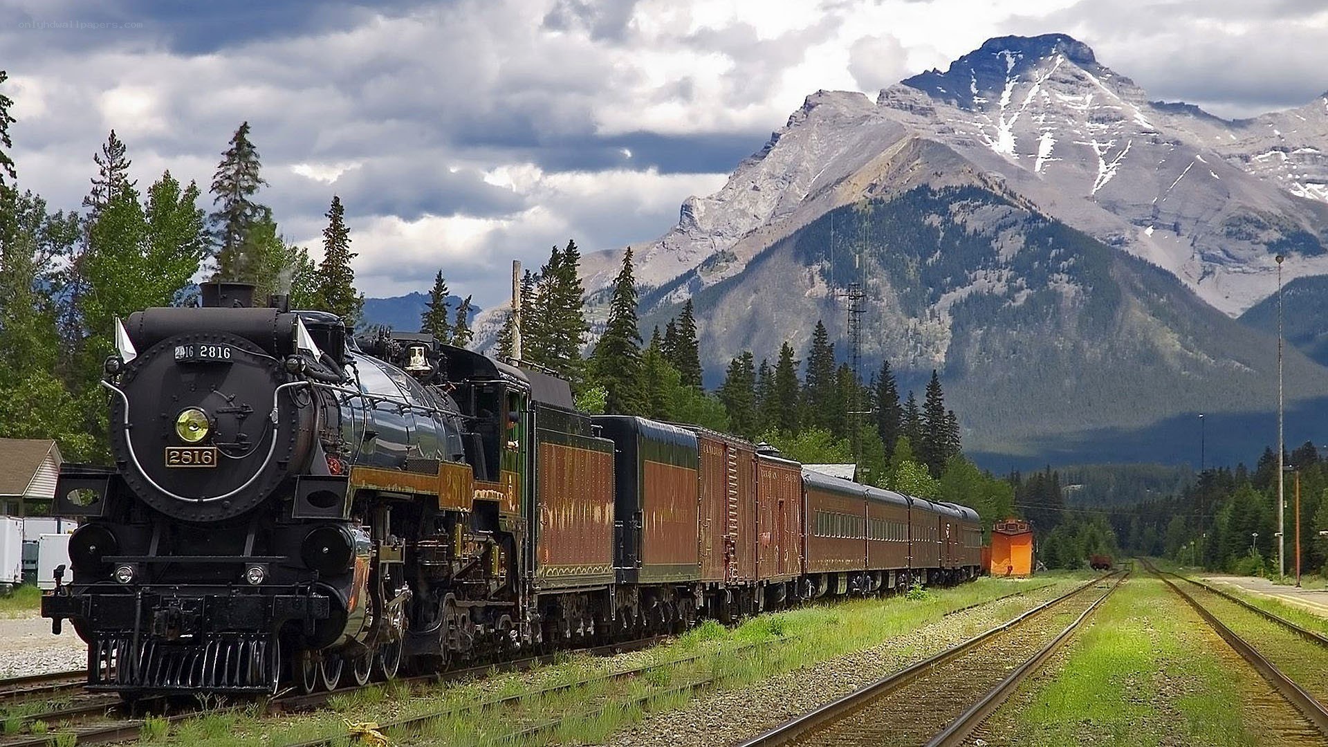 Steam train in mountain landscape