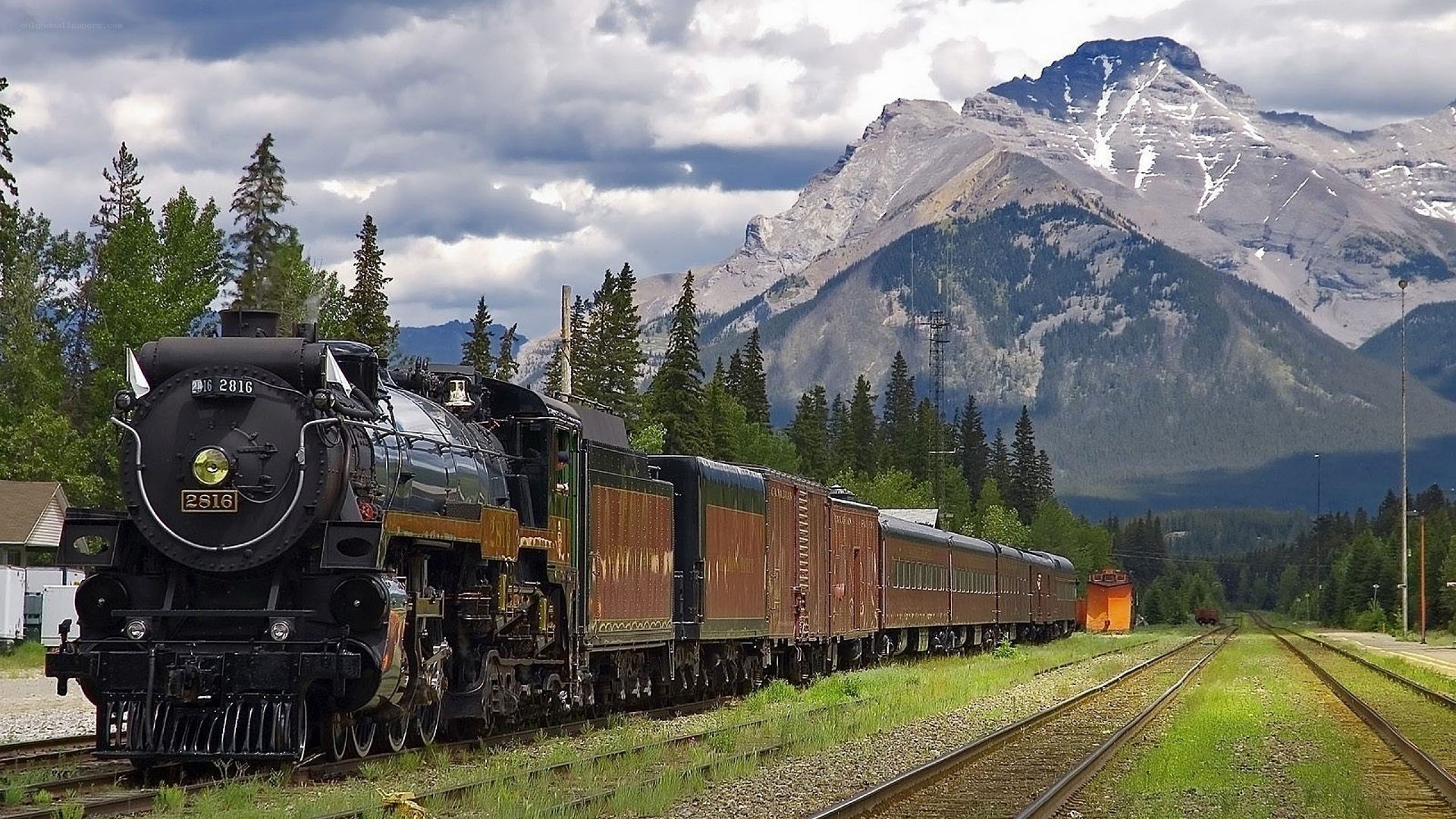 Steam train in mountain landscape