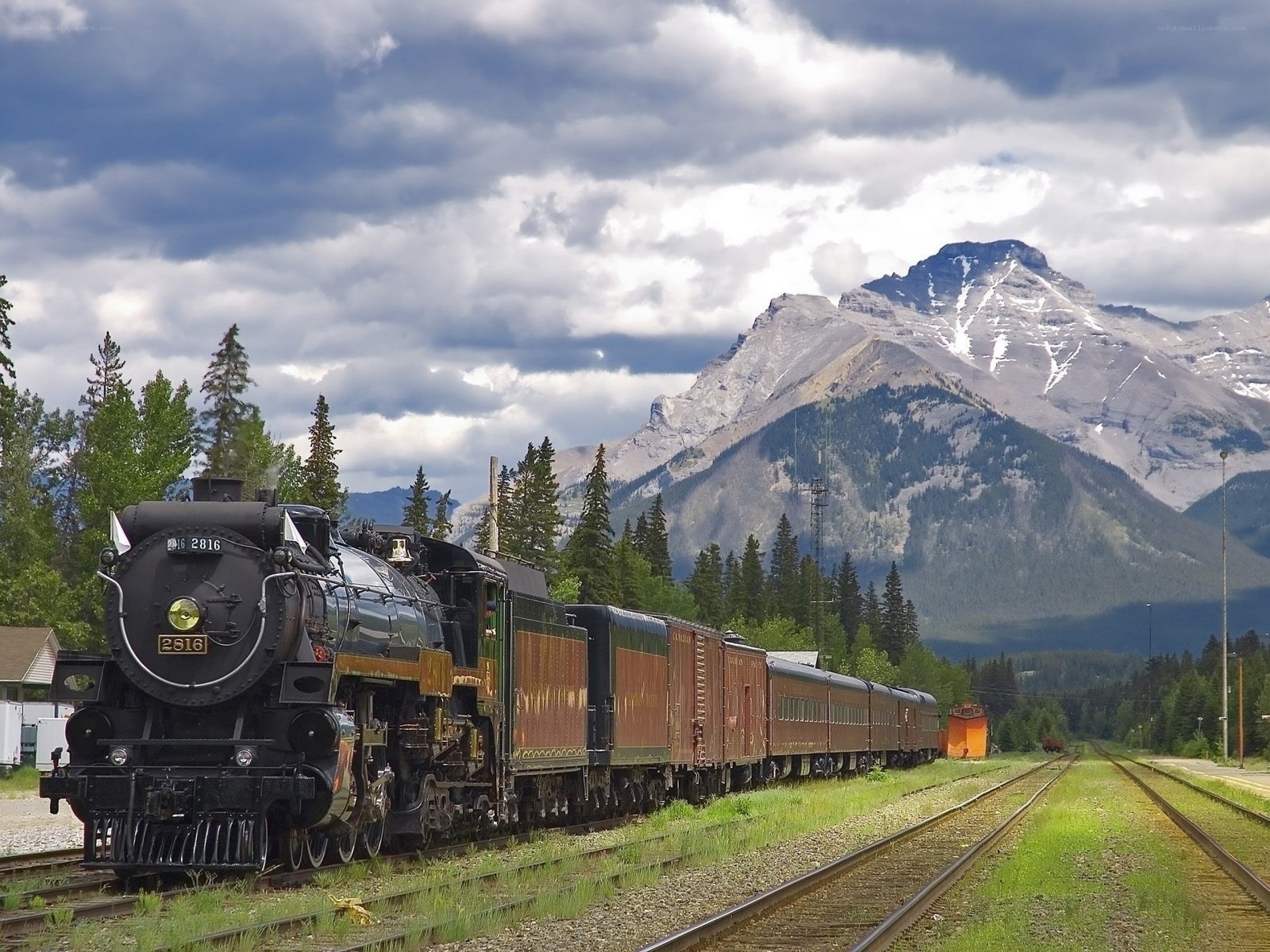 Steam train in mountain landscape