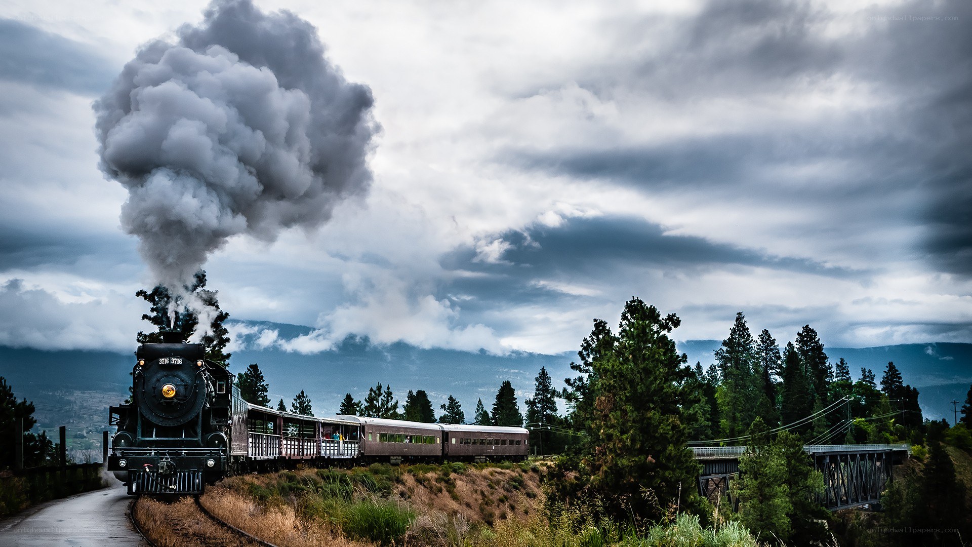 Steam train in mountain landscape