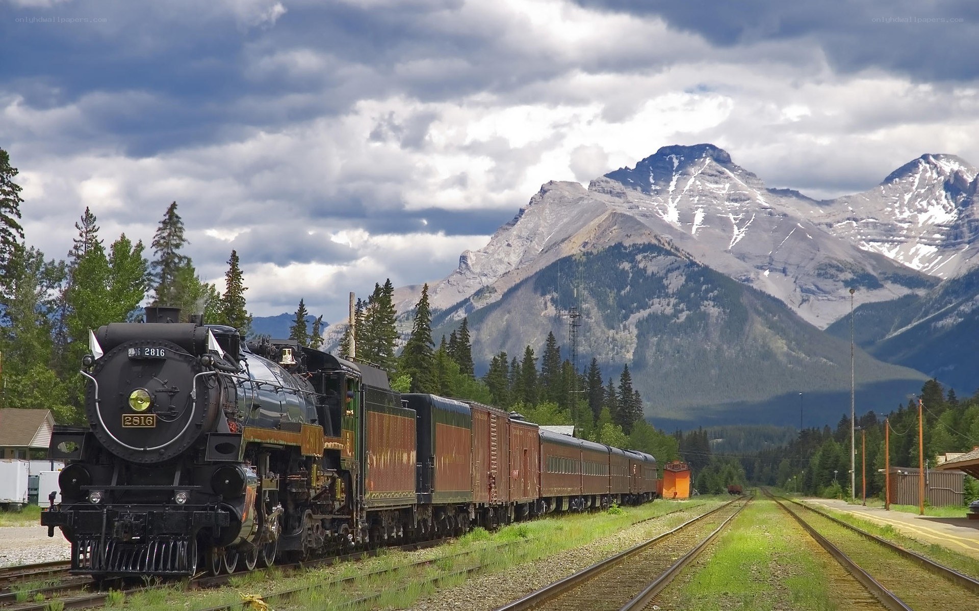 Steam train in mountain landscape