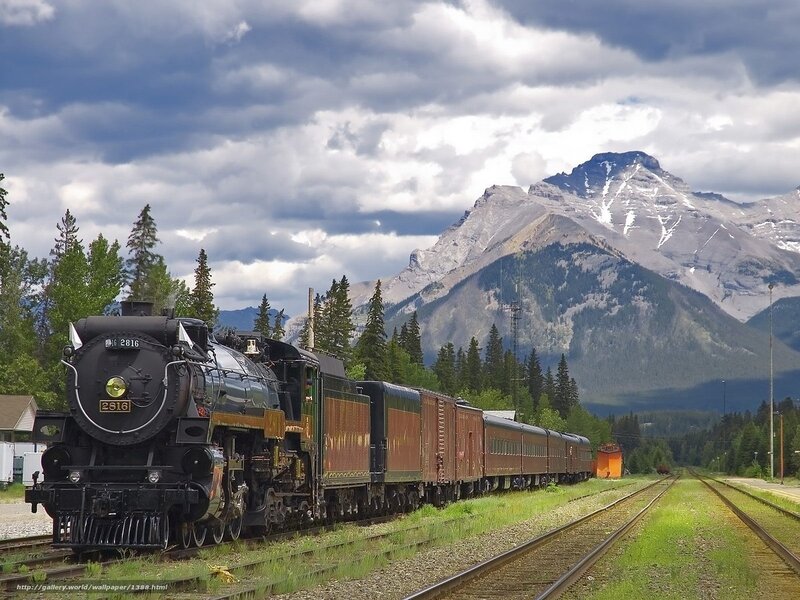 Steam train in mountain landscape