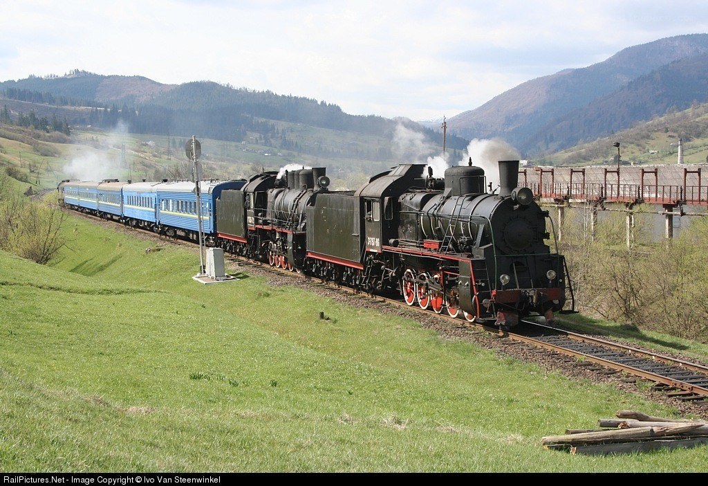 Steam train in mountain valley