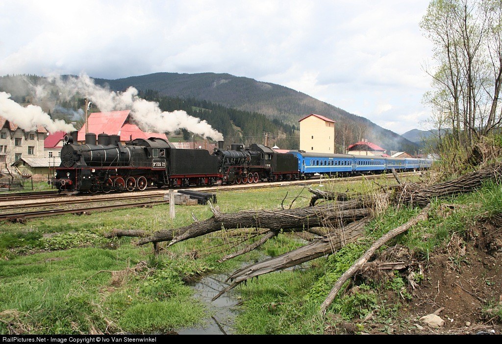 Steam train in mountain valley