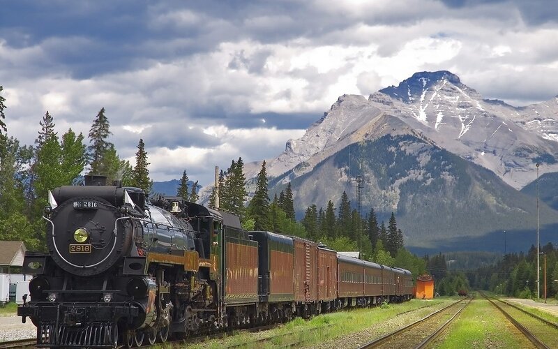Steam Train in Mountains — Green, Dramatic, Afternoon