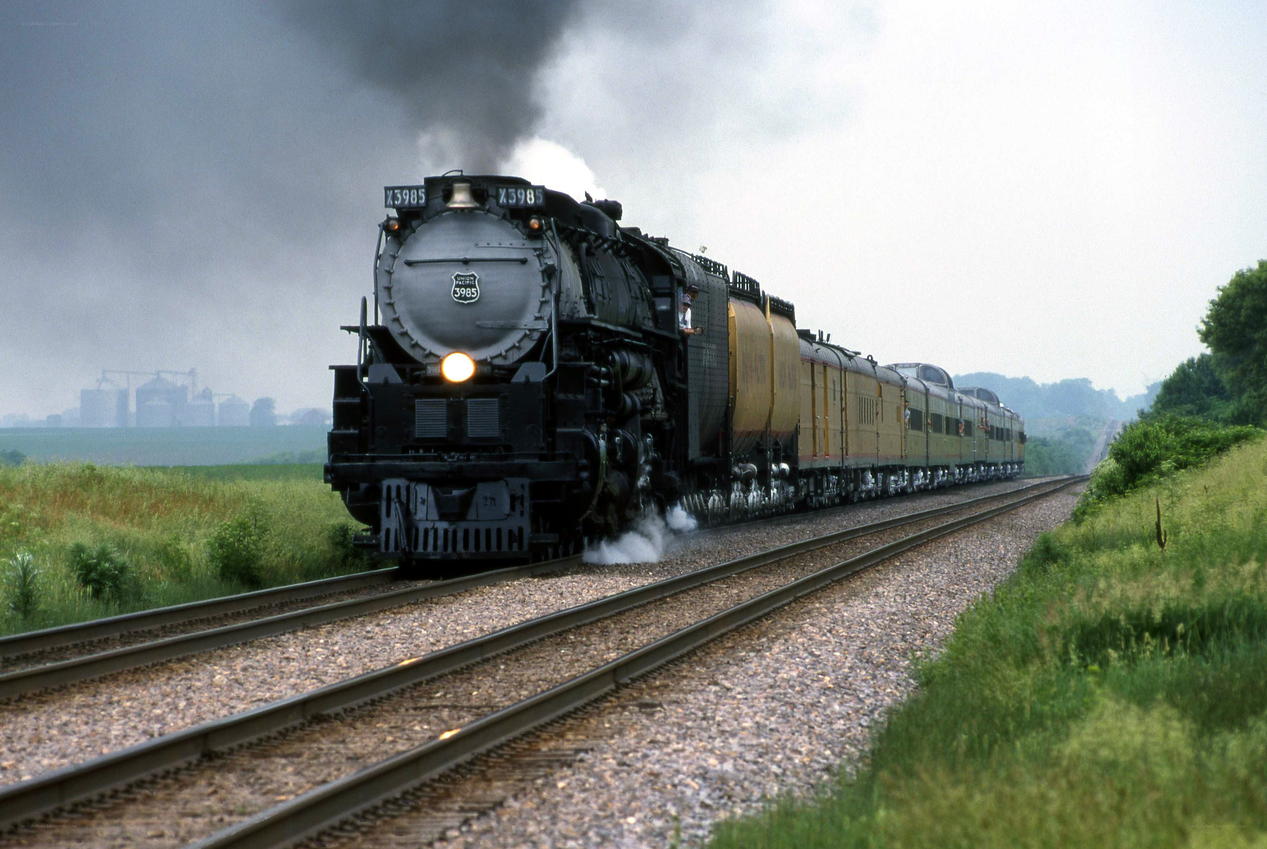 Steam train in rural landscape