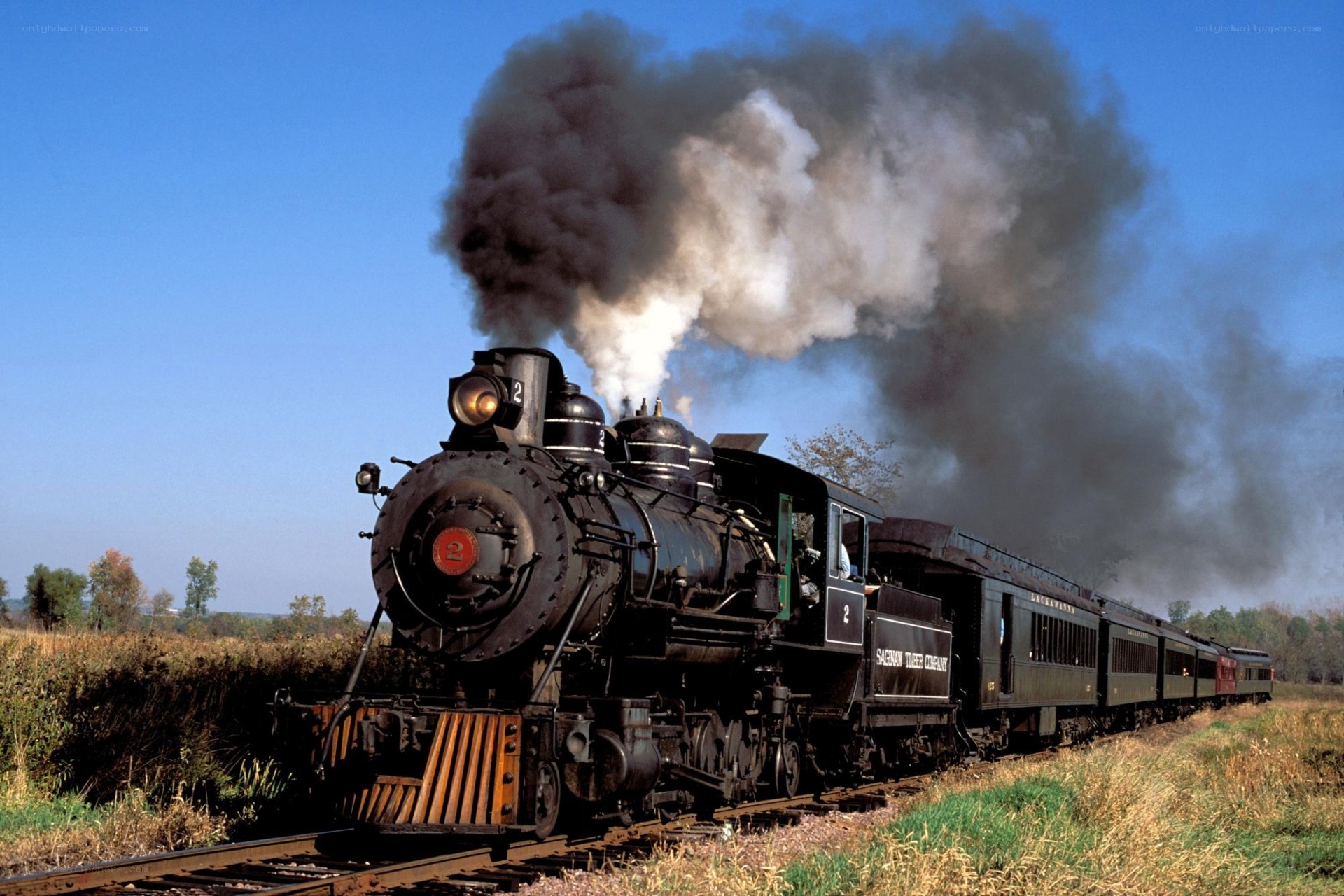 Steam train in rural landscape