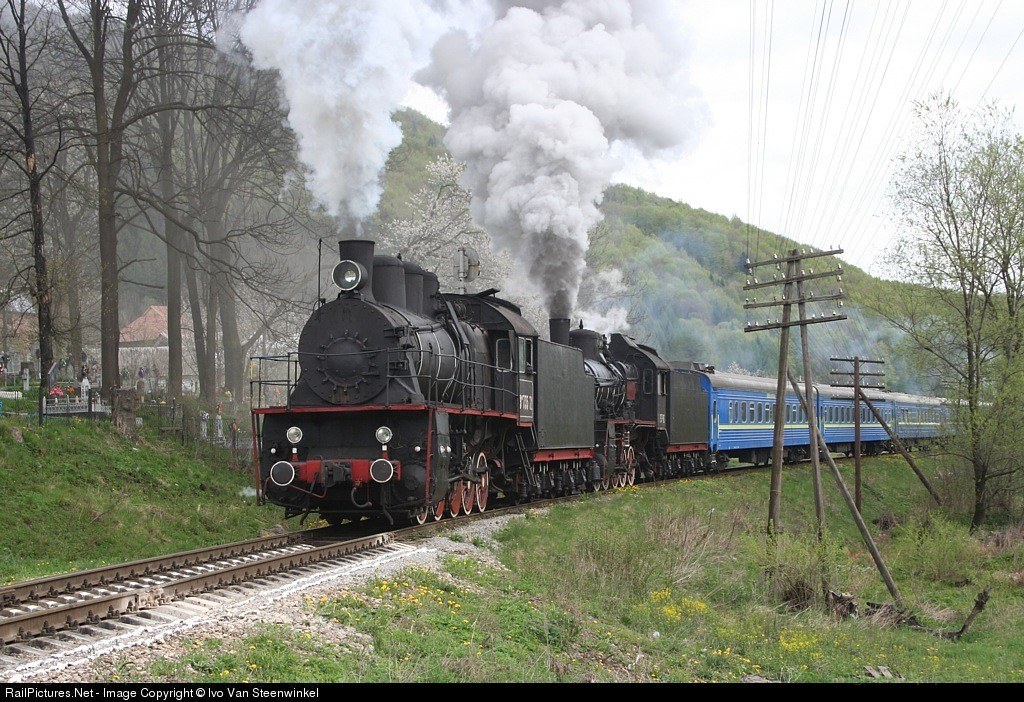 Steam train in rural landscape