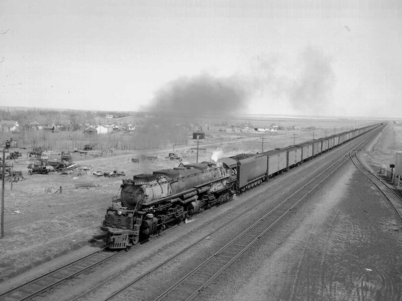 Steam train in rural town