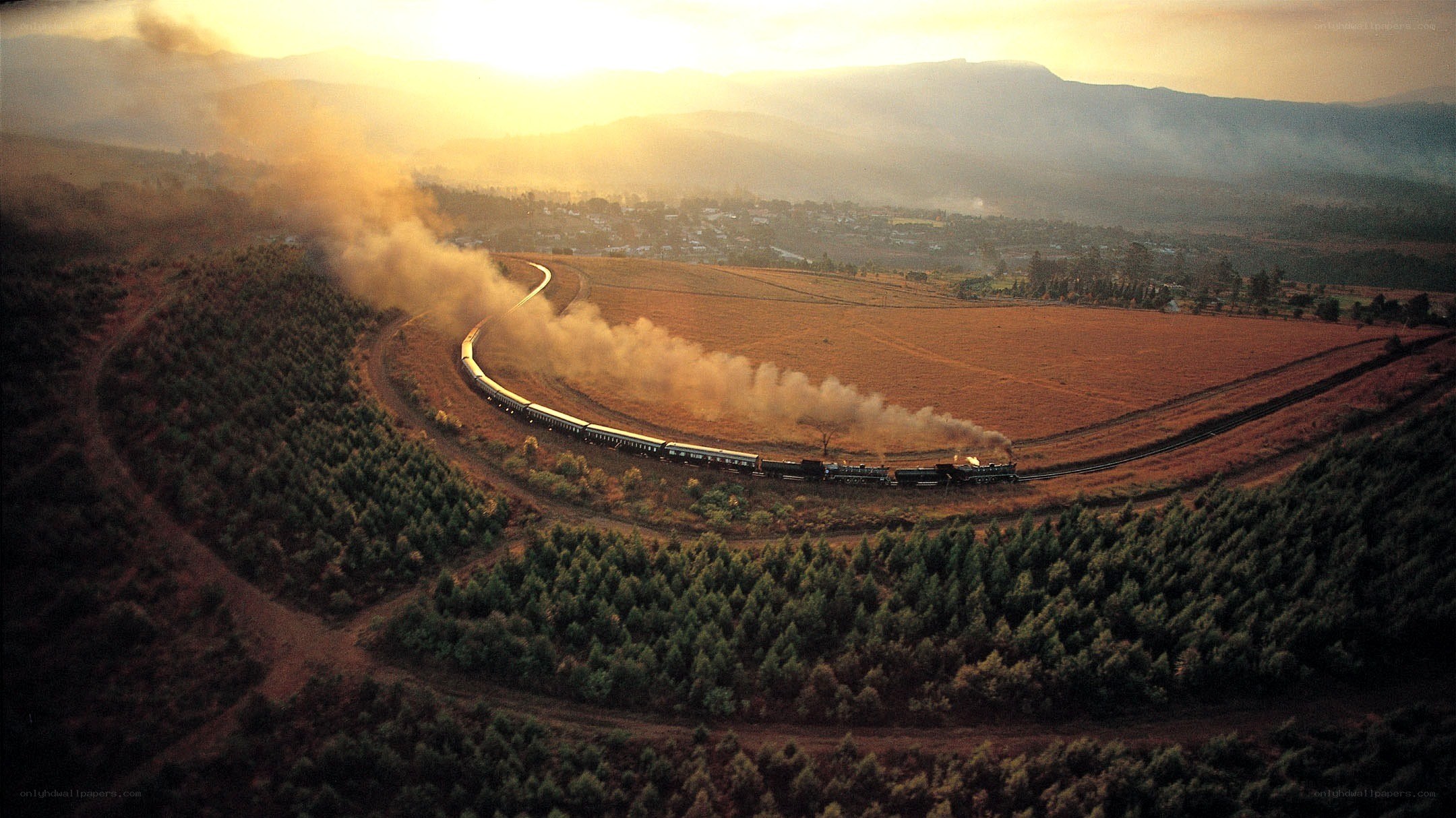 Steam train in scenic valley