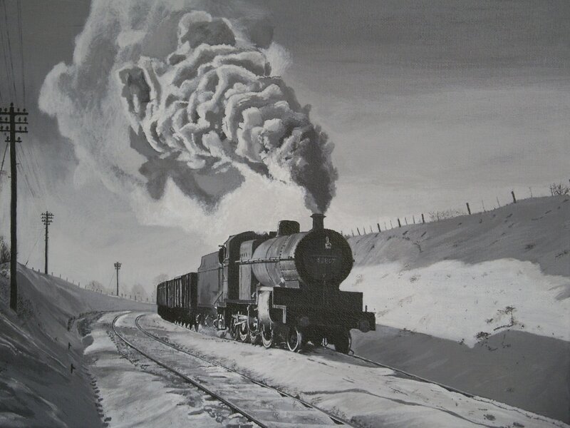 Steam train in snowy landscape