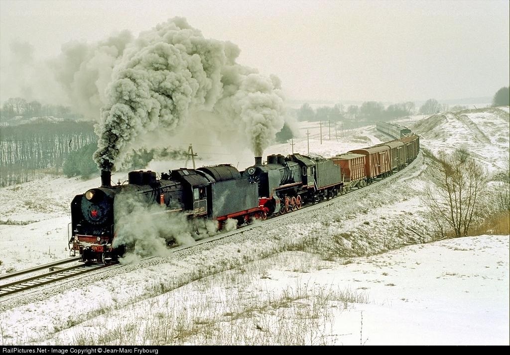 Steam train in winter landscape