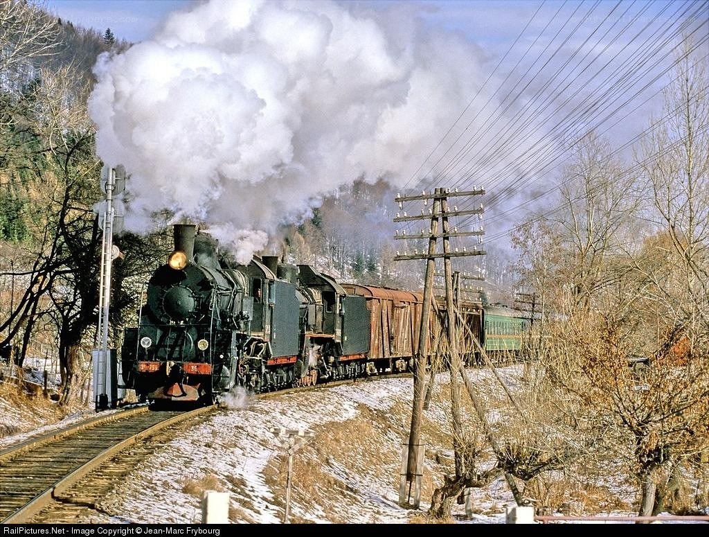Steam train in winter landscape