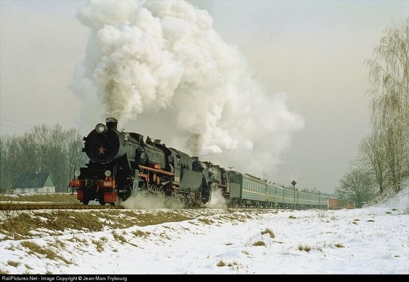 Steam train in winter landscape