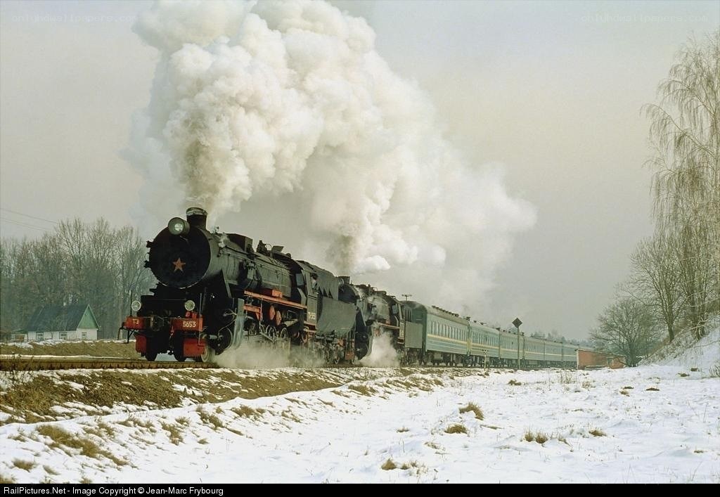 Steam train in winter landscape