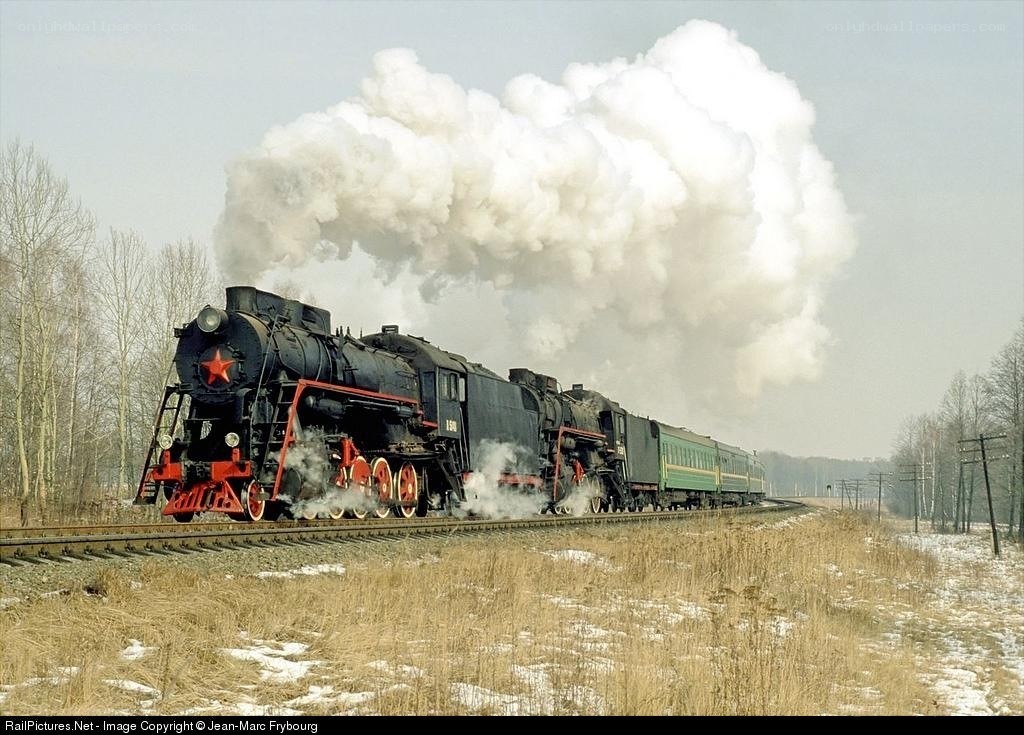 Steam train in winter landscape