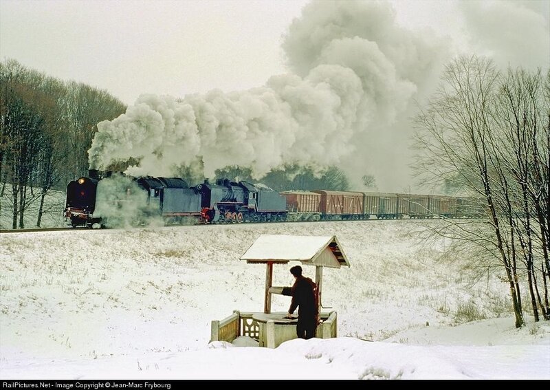 Steam train in winter landscape
