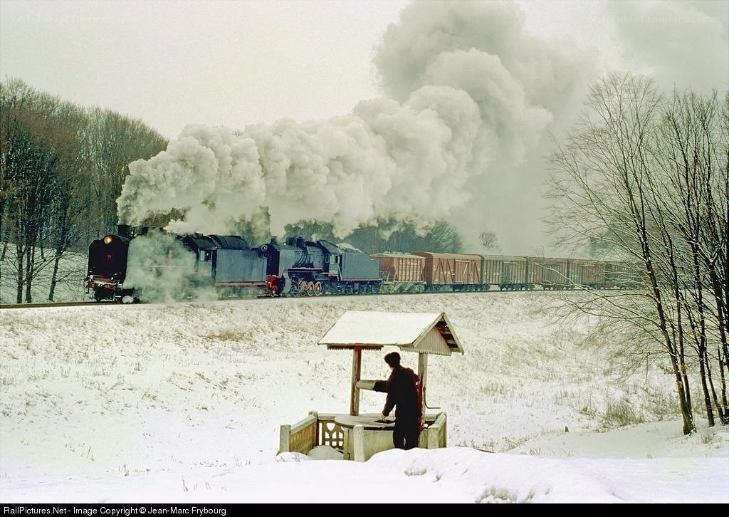 Steam train in winter landscape