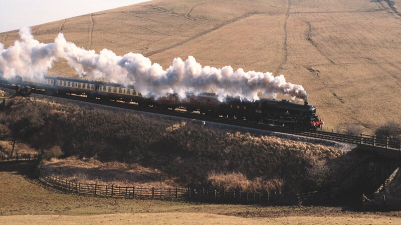 steam train on a hillside