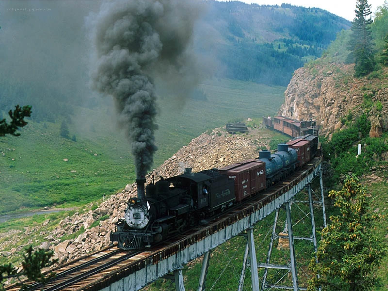 Steam train on a mountain bridge