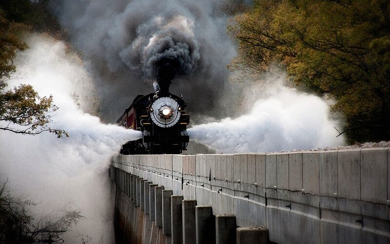 Steam Train on Bridge — Black, Dramatic, Autumn