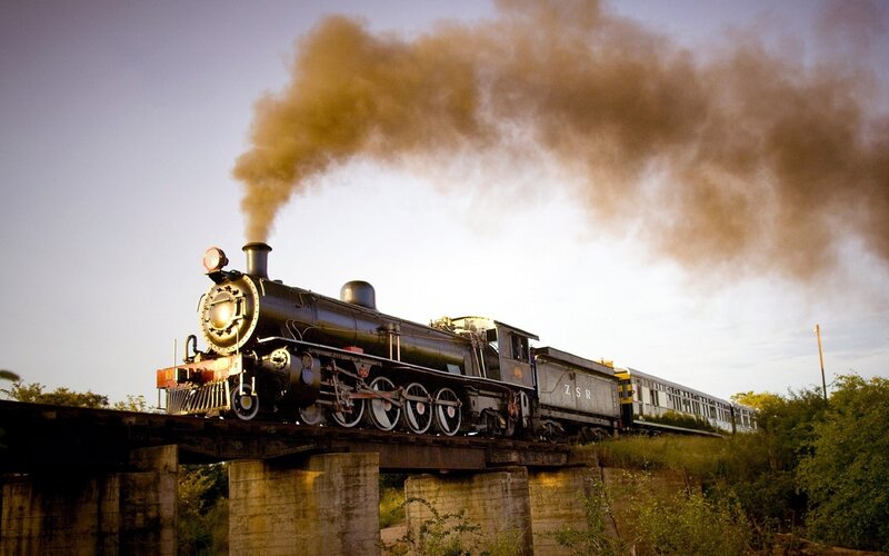 Steam Train on Bridge — Black, Dramatic, Sunset, Photograph, Smoke