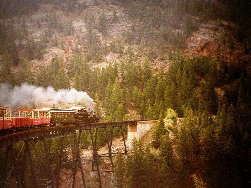 Steam Train on Bridge — Green, Dramatic, Afternoon, Photograph, Forest