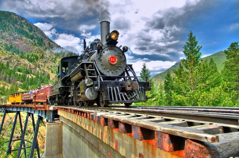Steam Train on Bridge — Green, Dramatic, Afternoon, Photograph