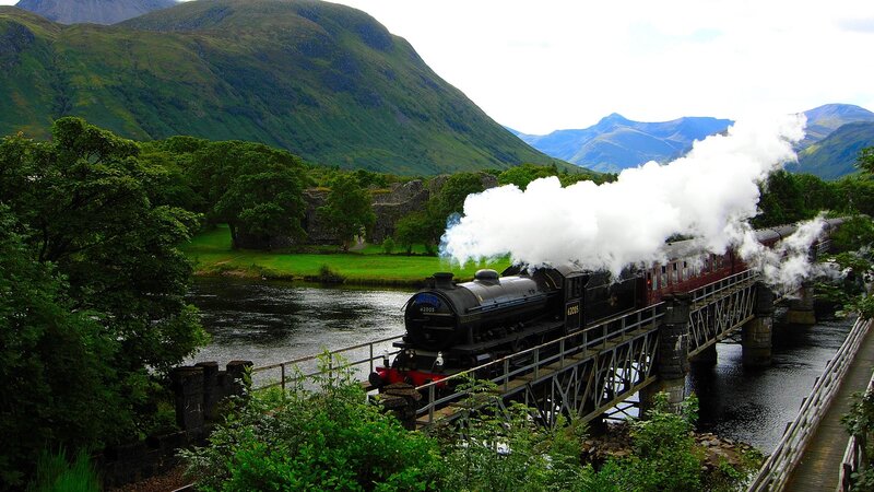 Steam Train on Bridge — Green, Serene, Afternoon, Photograph, River, Mountains