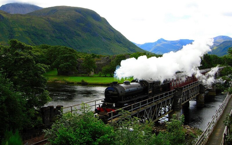 Steam Train on Bridge — Green, Serene, Afternoon, Photograph, River, Mountains, Trees