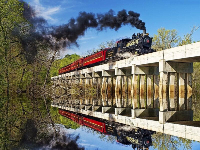 Steam Train on Bridge — Red, Dramatic, Spring