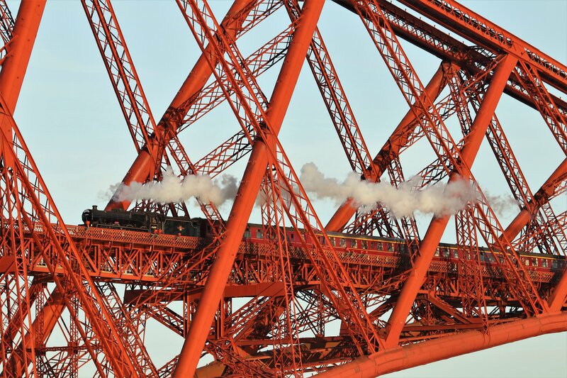 Steam Train on Bridge — Red, Dramatic, Sunset