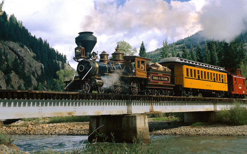 Steam Train on Bridge — Yellow, Dramatic, Afternoon, Photograph, River