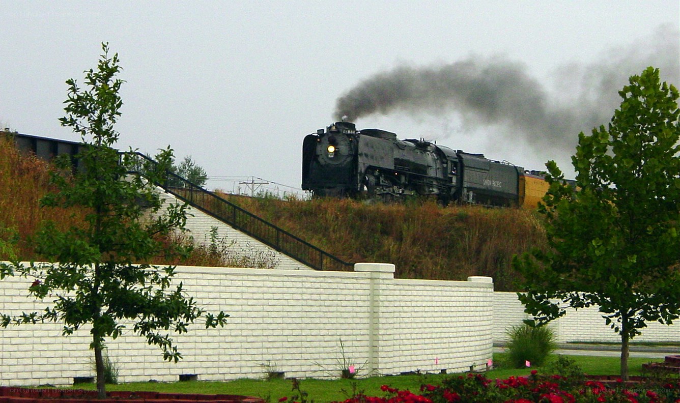 steam train on hillside