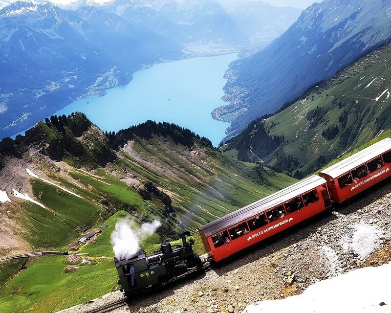 Steam train on mountain track