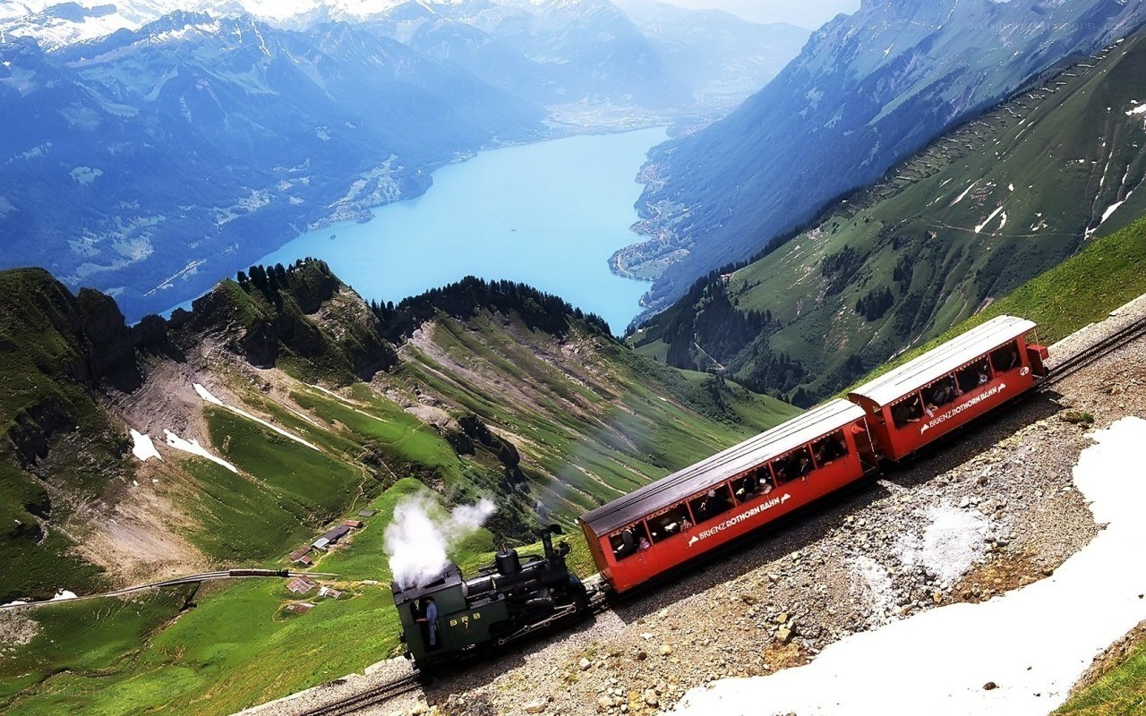 Steam train on mountain track