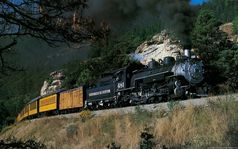 Steam Train on Mountain Track — Black, Dramatic, Afternoon, Photograph