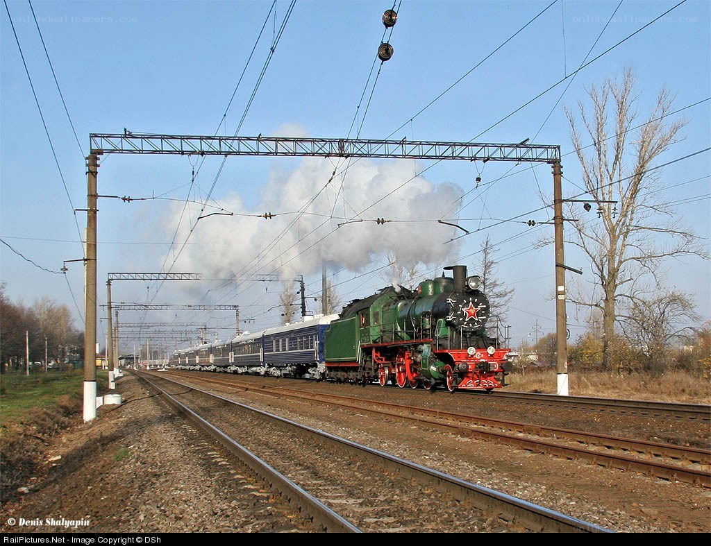 Steam train on railway tracks