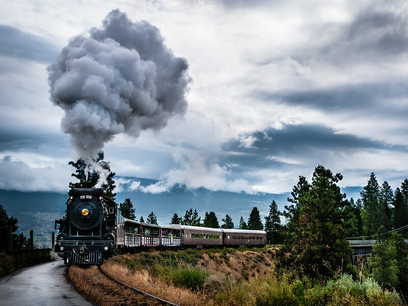 Steam Train on Track — Gray, Dramatic, Photograph, Smoke