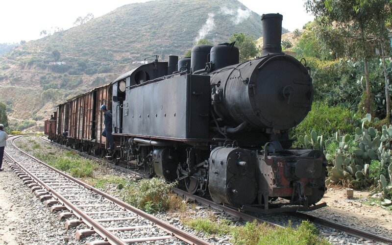 Steam Train on Tracks — Black, Calm, Afternoon, Photograph, Hills