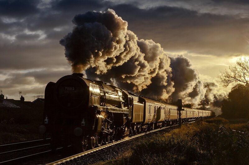Steam Train on Tracks — Black, Dramatic, Sunset, Photograph